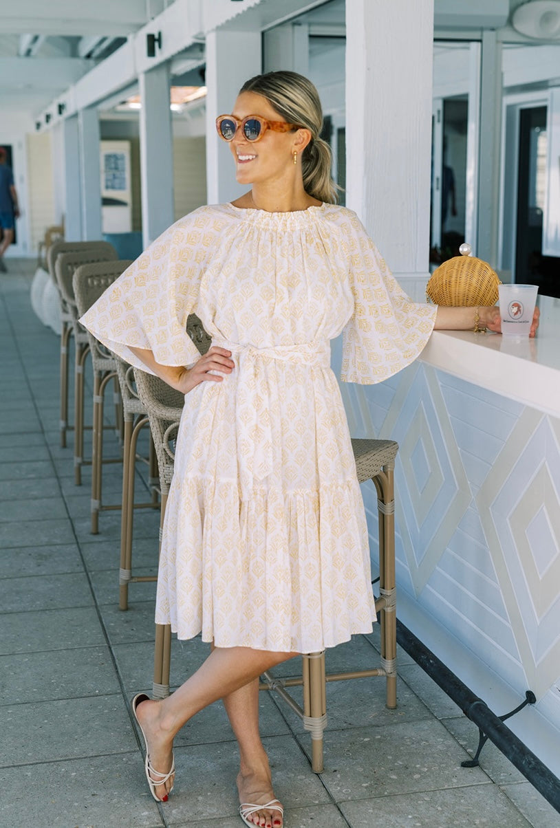 Yellow Floral Smocked Midi Dress by NAVYBLEU