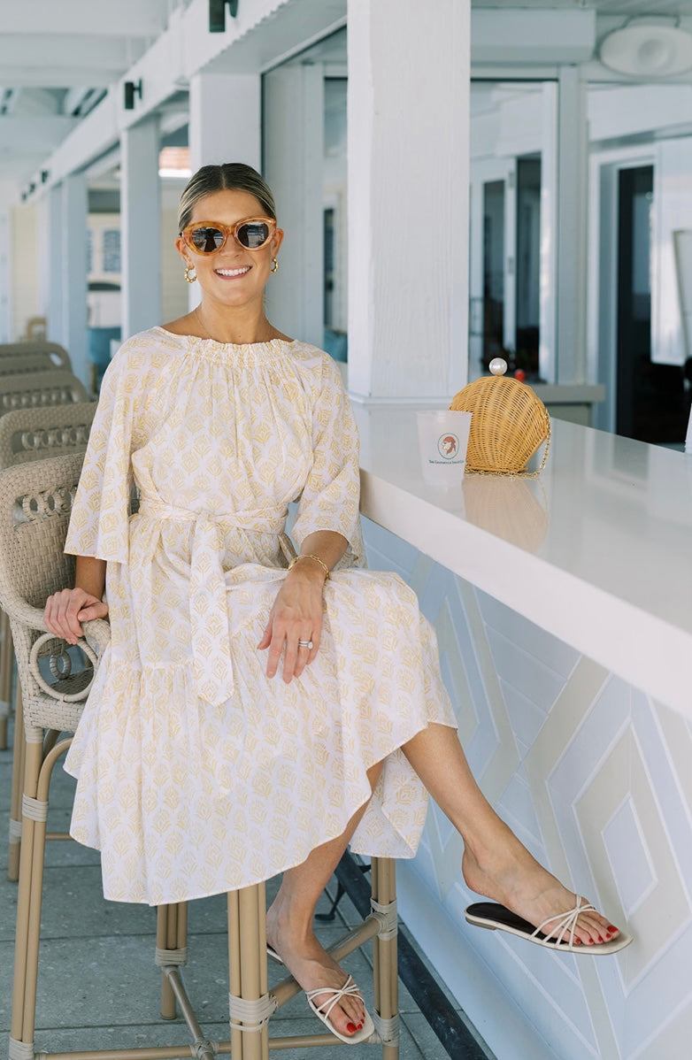 Yellow Floral Smocked Midi Dress by NAVYBLEU