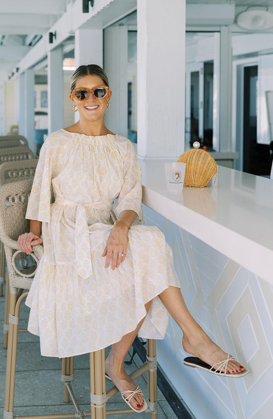 Yellow Floral Smocked Midi Dress by NAVYBLEU