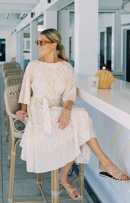 Yellow Floral Smocked Midi Dress by NAVYBLEU